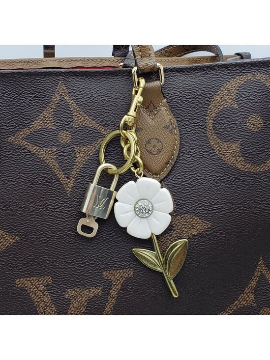 Louis Vuitton Accessories - Authentic Louis Vuitton Lock & Key with Unbranded Flower Charm, Keychain